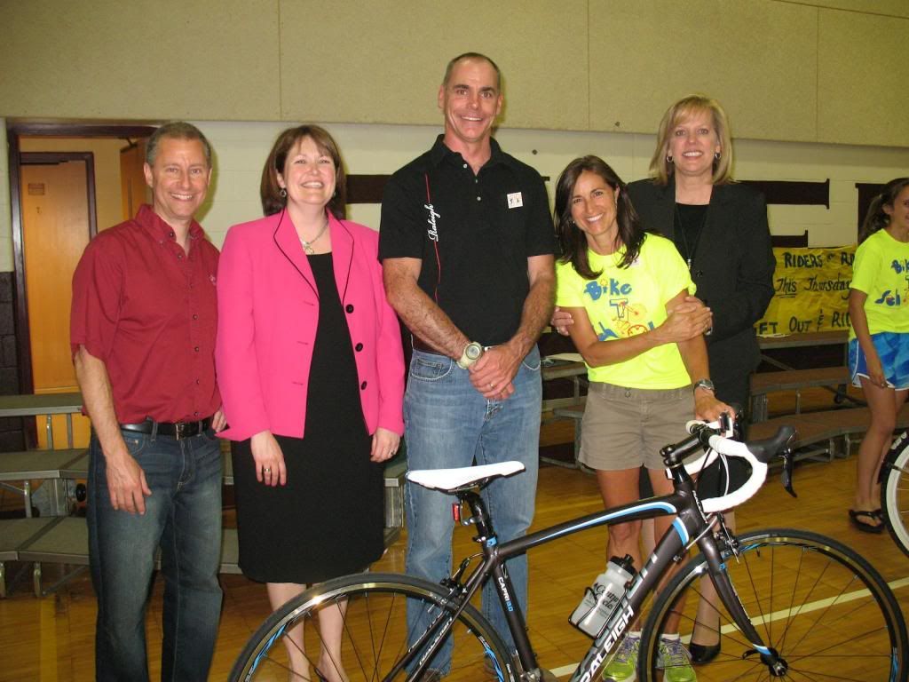 (From left) Scott Cowan/Century Cycles, Principal Megan Rose, Chris Speyer/ Raleigh Bicycles, RRMS Teacher Wendy Crites, and Mayor Pam Bobst.