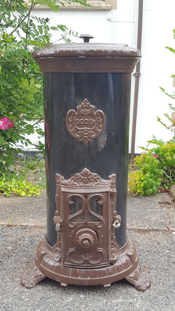 A Vintage French Painted Cast Iron Cylindrical Godin Wood Burning